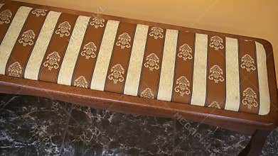 Vintage leather bench,standing in the restaurant