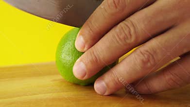 cutting lime into four halves