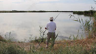 Fisherman fishing on a lake