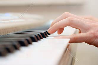 Hands and piano player