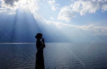 Girl praying to the God