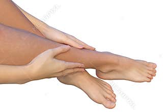 Woman holds her leg with fingers of her hands