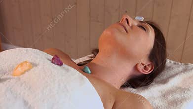 Woman at crystal healing session