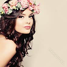 Beautiful Young Woman with Summer Pink Flowers