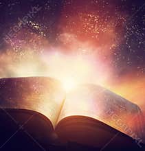 Open old book merged with magic galaxy sky, stars. Literature, h