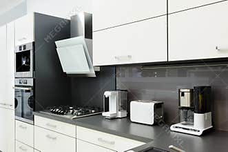 Modern white kitchen, clean interior design