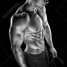 Fit young bodybuilder fitness male model posing
