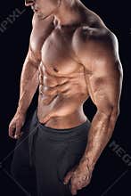 Fit young bodybuilder fitness male model posing