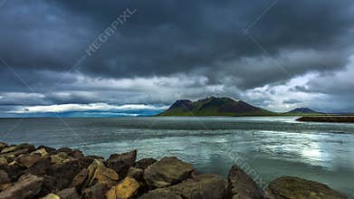 4K TimeLapse. Whirlpool of water and the storm clouds in the strait the Atlantic ocean. Iceland, 15 June 2015