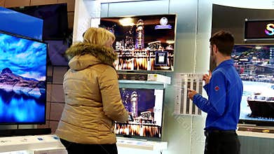 Shopper looking new TV to buy