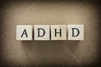 ADHD abbreviation on wooden blocks