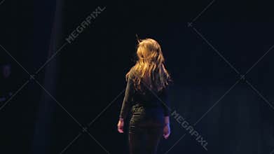 Girl playing in the performance