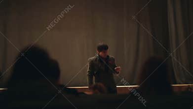 Man explains something to the public