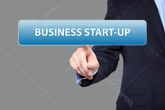 Business, technology and networking concept - businessman pressing business start-up button on virtual screens