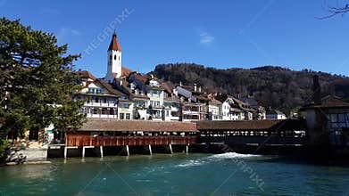 4K video of the famous old Thun Castle and wooden bridge . Switzerland.