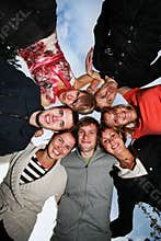 Group of happy young people in circle
