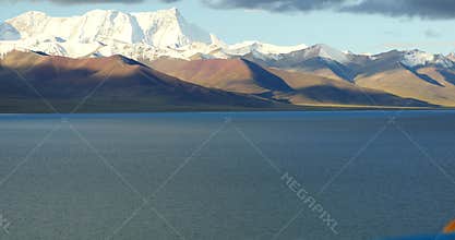 4k huge clouds mass rolling over lake namtso & snow mountain, tibet mansarovar.