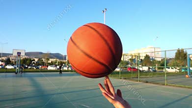 Basketball Spinning on Finger in Open Area