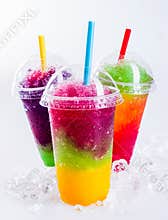 Frozen Rainbow Slush Drinks Chilling on Ice