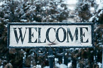 Sign in borders that says welcome