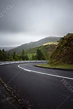 Road turn bending downhill to the right - Azores, Sao Miguel Isl