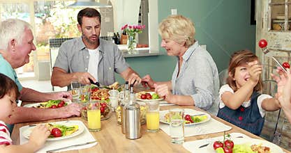 Extended family having dinner