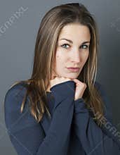 Portrait of a reserved young beautiful girl acting introvert