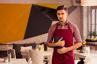 Waiter in eatery