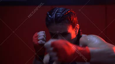 Brunette strong fitness woman at the gym