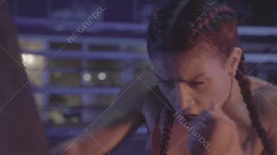 Brunette strong fitness woman at the gym