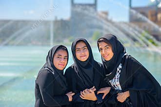 Young Muslims in a hijab at Imam Square in Isfahan