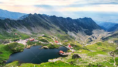 Balea Lake, seen from above. Glacial lake, on Transfagarasan highway in Carpathian mountains, Romania in summer