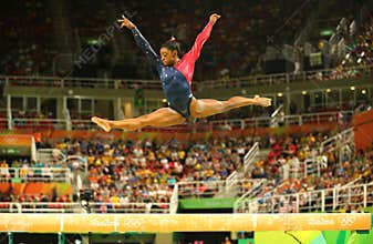 Olympic champion Simone Biles of United States competing on the balance beam at women's all-around gymnastics qualification