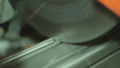 Metal cutting with circular saw in Factory