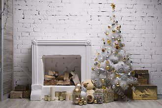 White Christmas tree with golden and silver balls, gift boxes, holiday decorations equipped fireplace