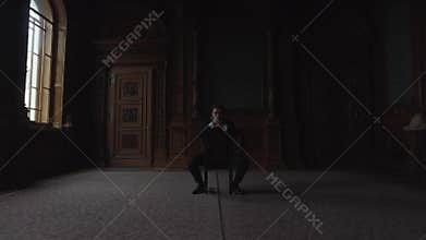 Thoughtful Man Sitting On Chair