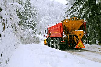 Snow plow truck in winter