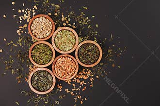 Assortment of dry tea in little bowls