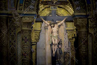 Catholic church and Jesus Christ on crucifix.