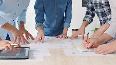 Young Asian business financial team work together in project brainstorm meeting. Cooperate teamwork, strategy planning concept