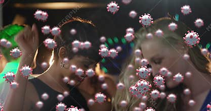 Digital composite video of Covid-19 cells moving against group of friends dancing in background