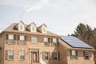 Colonial house with solar panel
