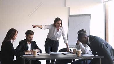 Female boss during group meeting asking to leave black employee