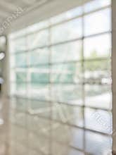 Office building lobby hall blur background or blurry school hallway corridor interior view looking toward empty corridor entrance