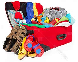Family travel red suitcase packed for vacation