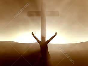 Man kneeling at the Cross of Jesus Christ