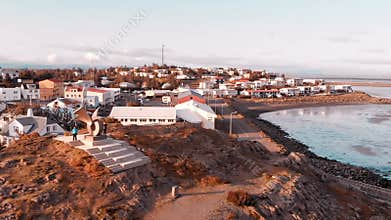 Aerial view of Borgarnes in Snaefellsnes Peninsula, Iceland. Sunset in summer season. Slow motion