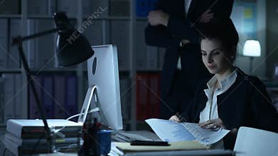 Boss waking up a lazy employee