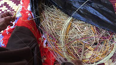 Native Australian Aboriginal woman basket weaving