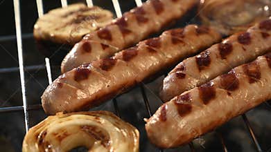 Sausages are grilled on sunny day